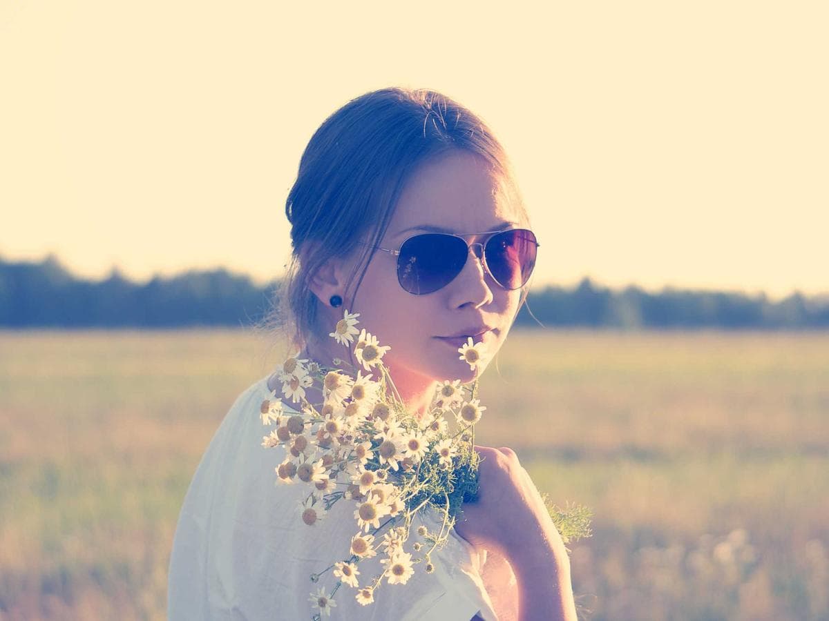 Editorial portrait of a woman in soft natural light
